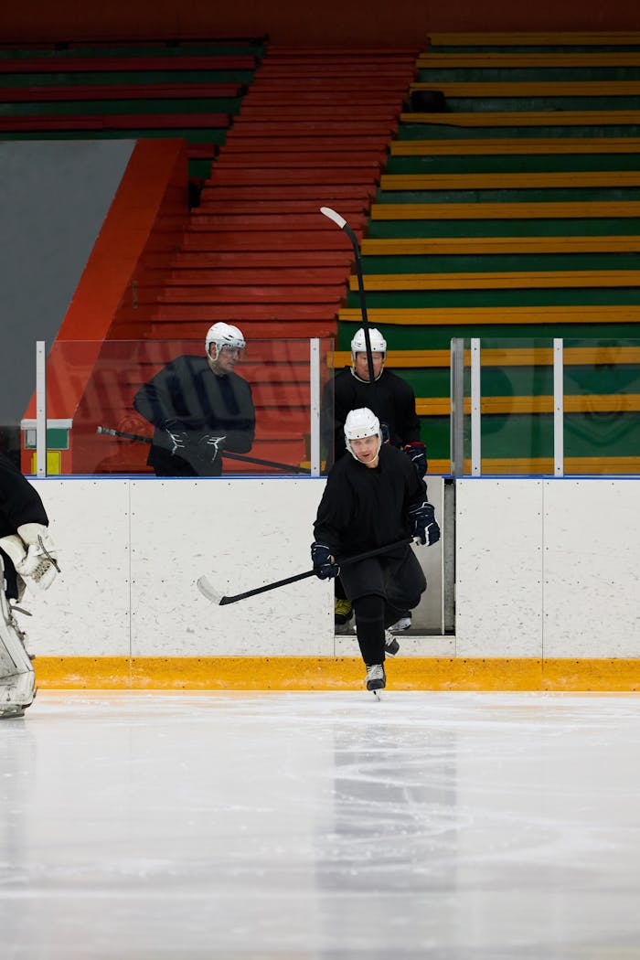 Crafting Captivating Headlines: Your awesome post title goes here A team of ice hockey players entering the rink, ready to play a match indoors.